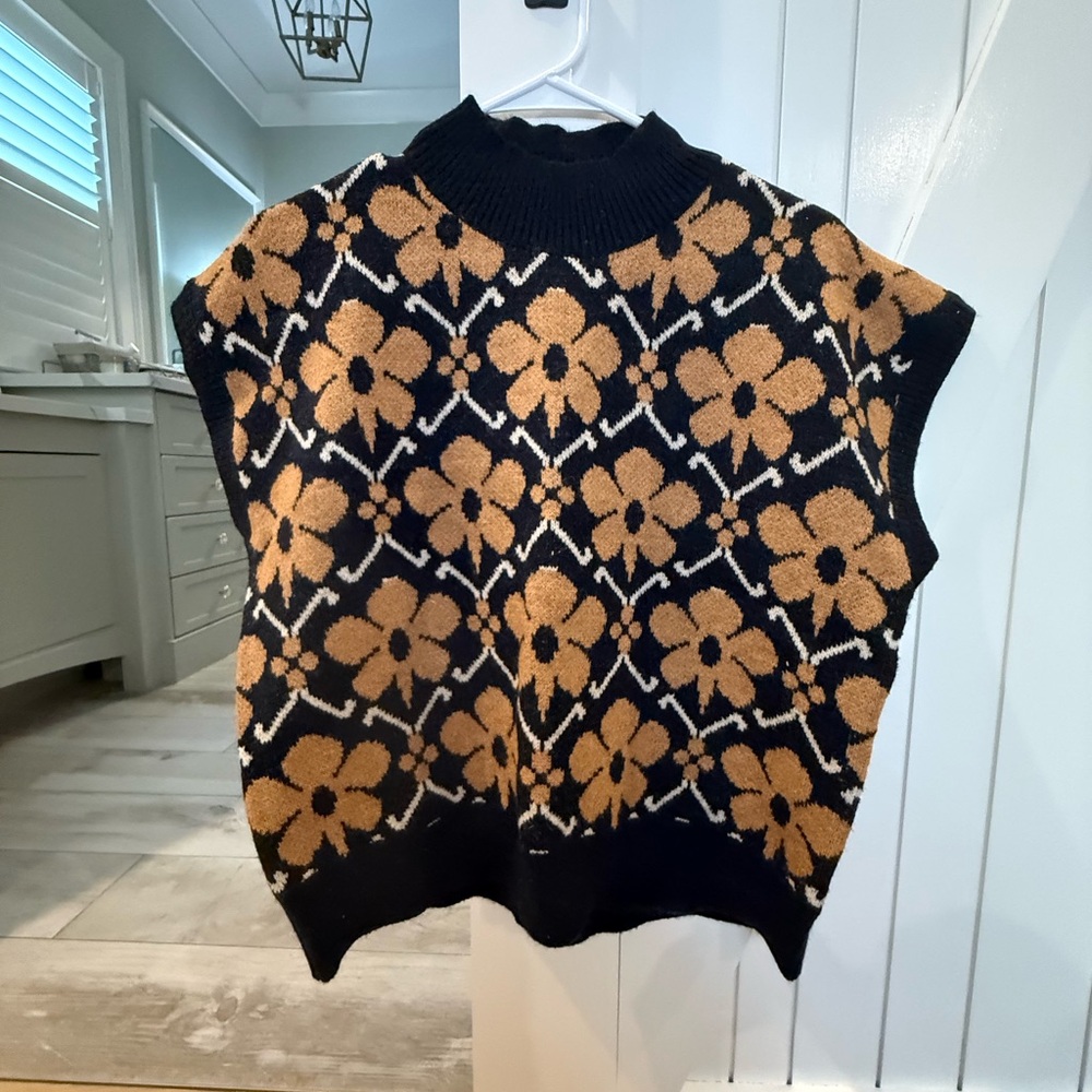 Never worn Entro vest, size M